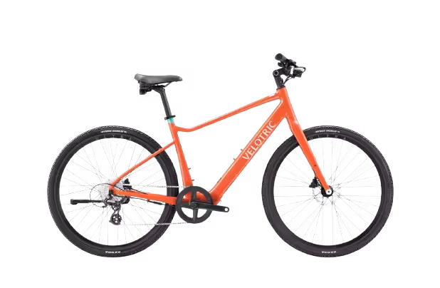 Velotric T1 ST Plus Light Step-Over Fitness Electric Bike finished in Lava: side view